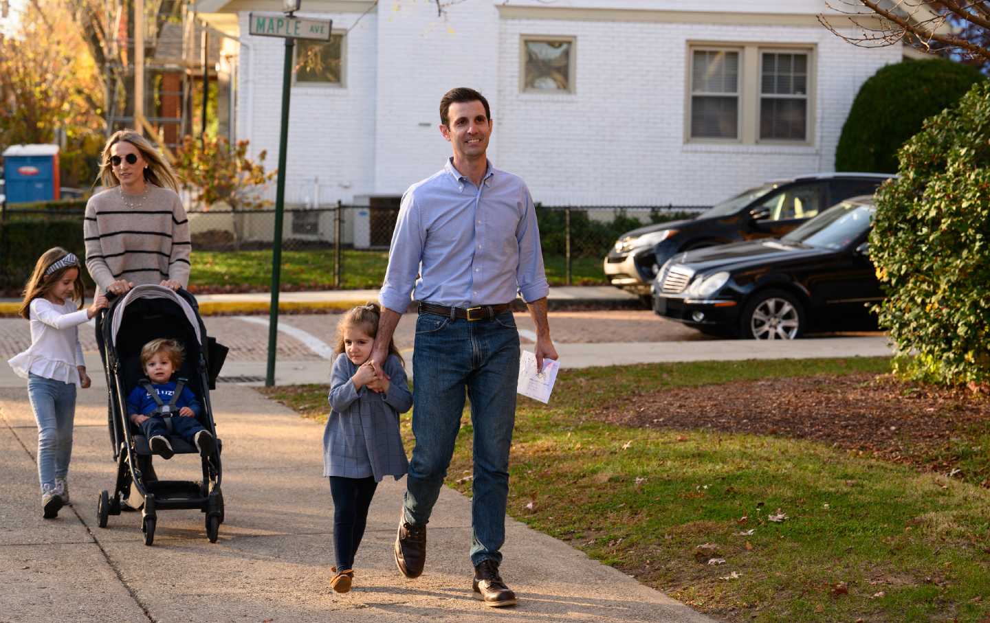 Chris Deluzio, Democratic representative candidate for Pennsylvania, arrives with his family to vote at a polling location in Aspinwall, Pennsylvania, on November 8, 2022.