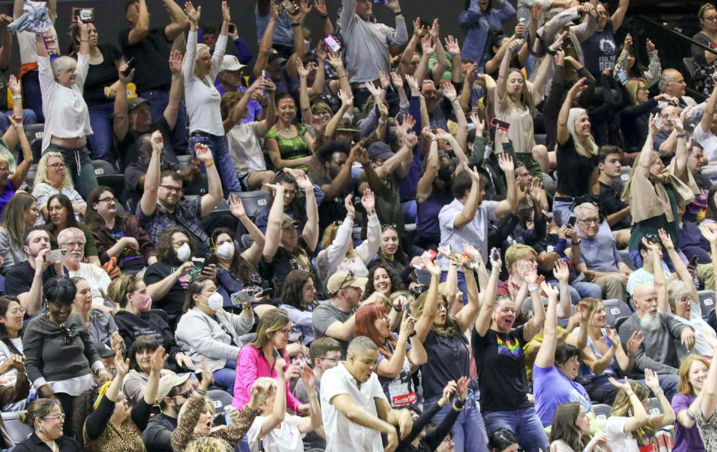 Crowd cheers and does the wave before Bernie Sanders and Alexandria Ocasio-Cortez speak at the Fighting Oligarchy: Where do we go from here tour to Arizona State University's Mullet Arena in Tempe, Arizona USA on March 20, 2025.