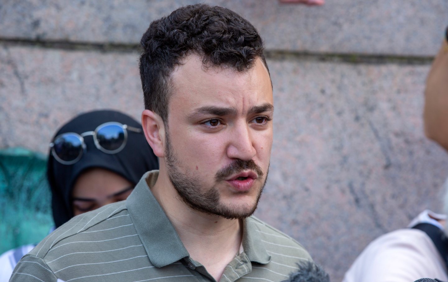 Mahmoud Khalil, a student negotiator during the protests at Columbia University against the Gaza genocide, speaks to the press on April 29, 2024.