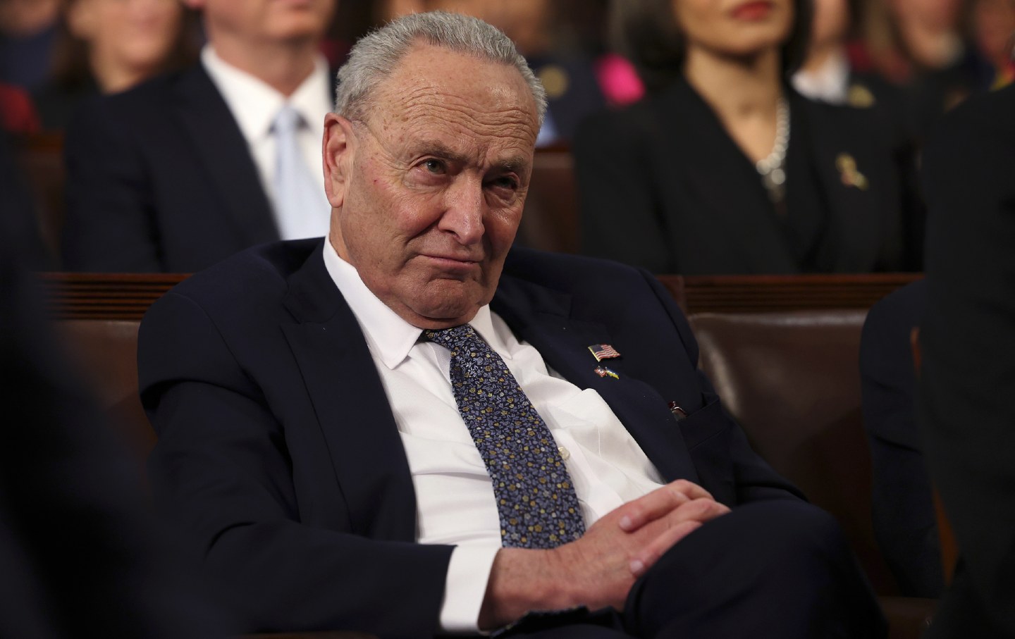 Senate minority leader Chuck Schumer listens as President Donald Trump addresses a joint session of Congress at the U.S. Capitol on March 4, 2025, in Washington, DC.