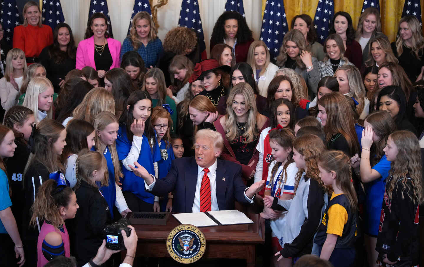 President Donald Trump joined by cis-women athletes, signing the “No Men in Women’s Sports” executive order in the East Room at the White House, on February 5, 2025.