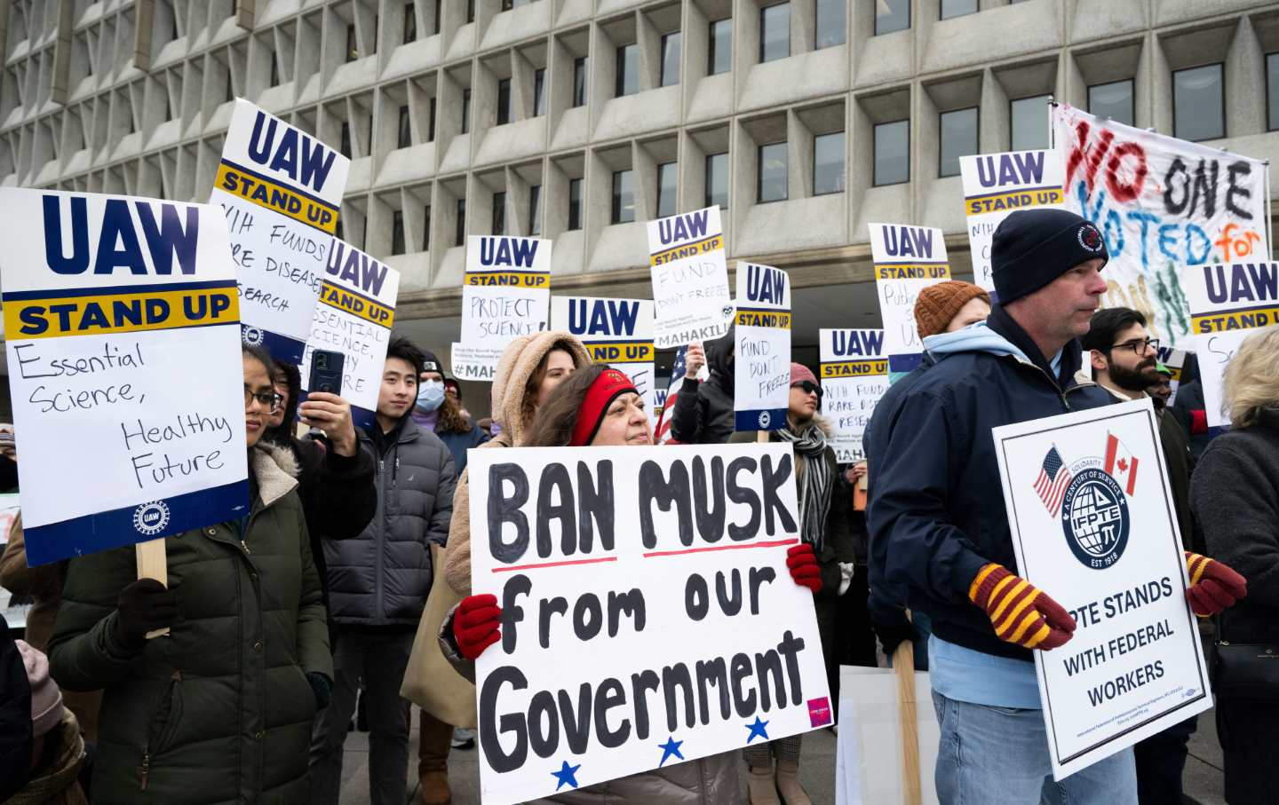 A protest against US President Donald Trump and Elon Musk’s DOGE cuts to medical research and higher education during a “Fund Don't Freeze” rally outside the Health and Human Services headquarters in Washington, DC, on February 19, 2025.