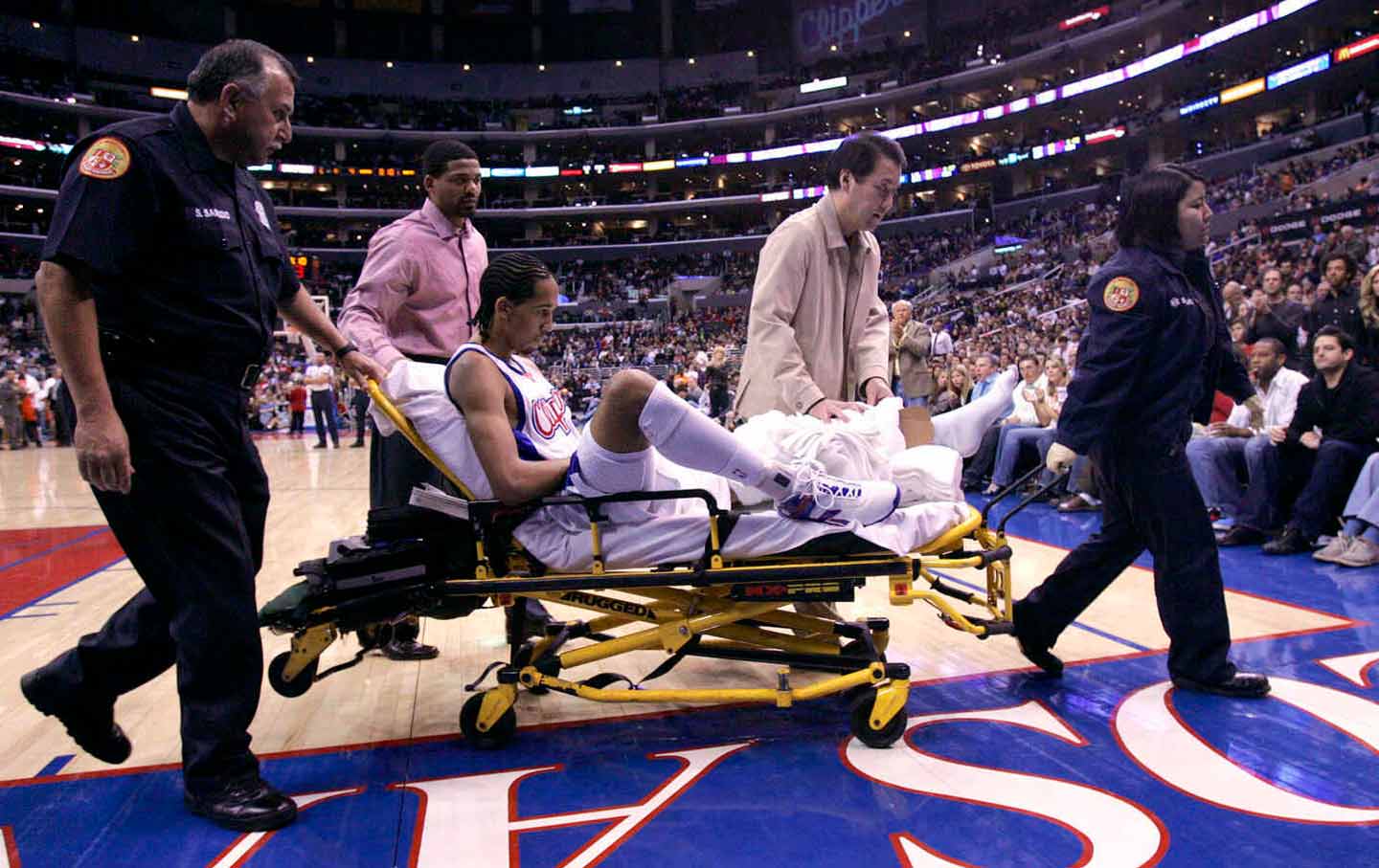 Clipper Shaun Livingston is taken off the court after getting injured at the Staples Center in Los Angeles on Monday, February 26, 2007.