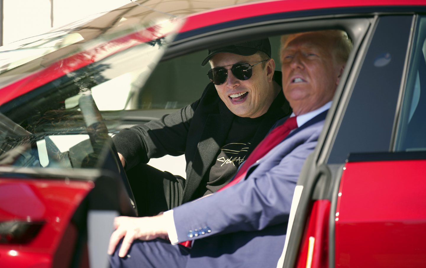 President Donald Trump and White House senior adviser, Tesla and SpaceX CEO Elon Musk sit in a Tesla Model S on the South Lawn of the White House on March 11, 2025, in Washington, DC.