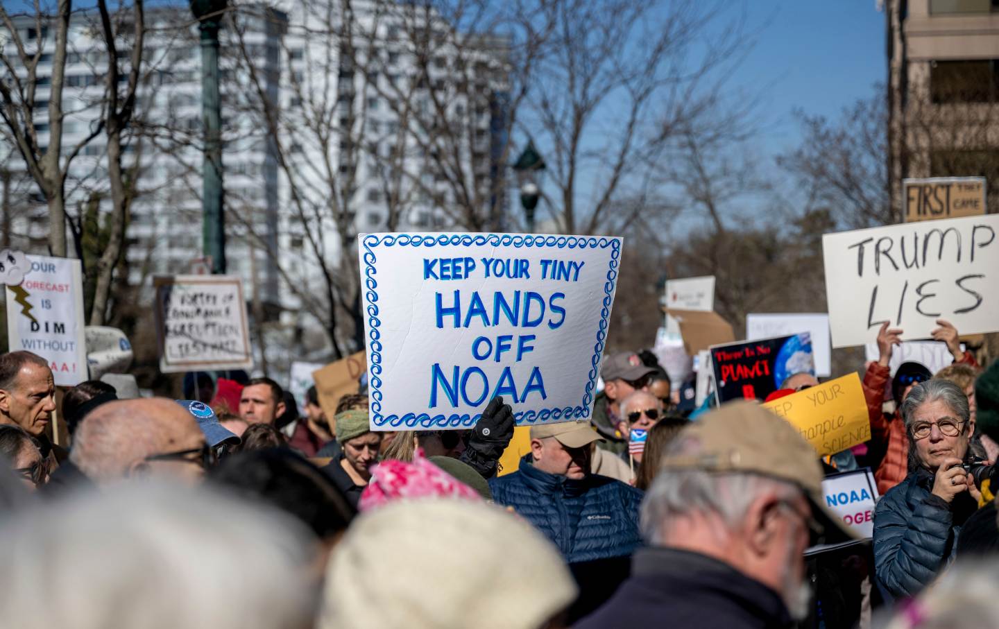 Protesters rally outside the National Oceanic and Atmospheric Administration (NOAA) headquarters in Silver Spring, Maryland, on Monday, March 3, 2025.